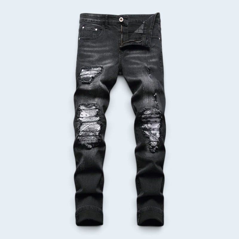 Męskie jeansy slim fit z przetarciami i kolorowymi naszywkami