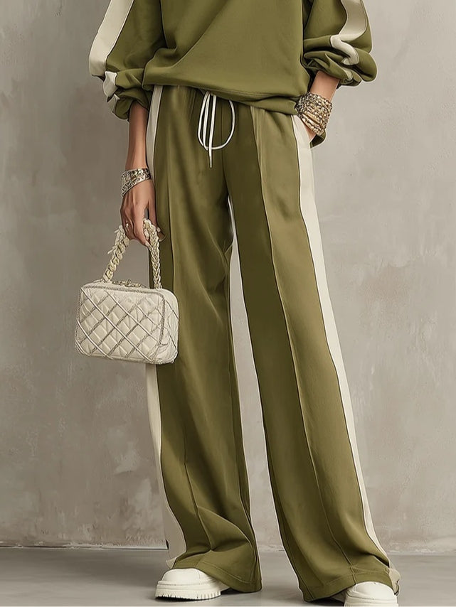 Oliwkowy damski komplet z bluzą i szerokimi spodniami z jasnymi lampasami