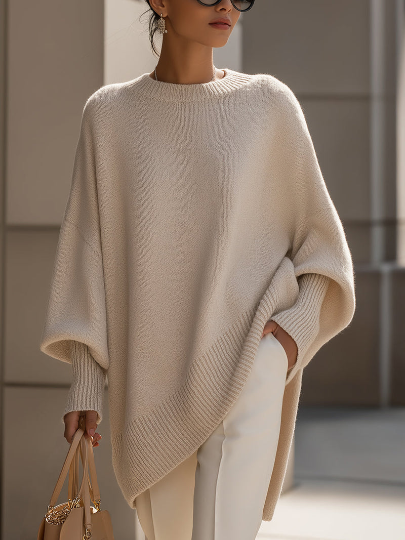 Damski sweter oversize z okrągłym dekoltem i dłuższym tyłem