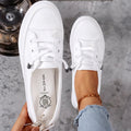 Damskie sneakersy sznurowane z okrągłym noskiem i płaską podeszwą