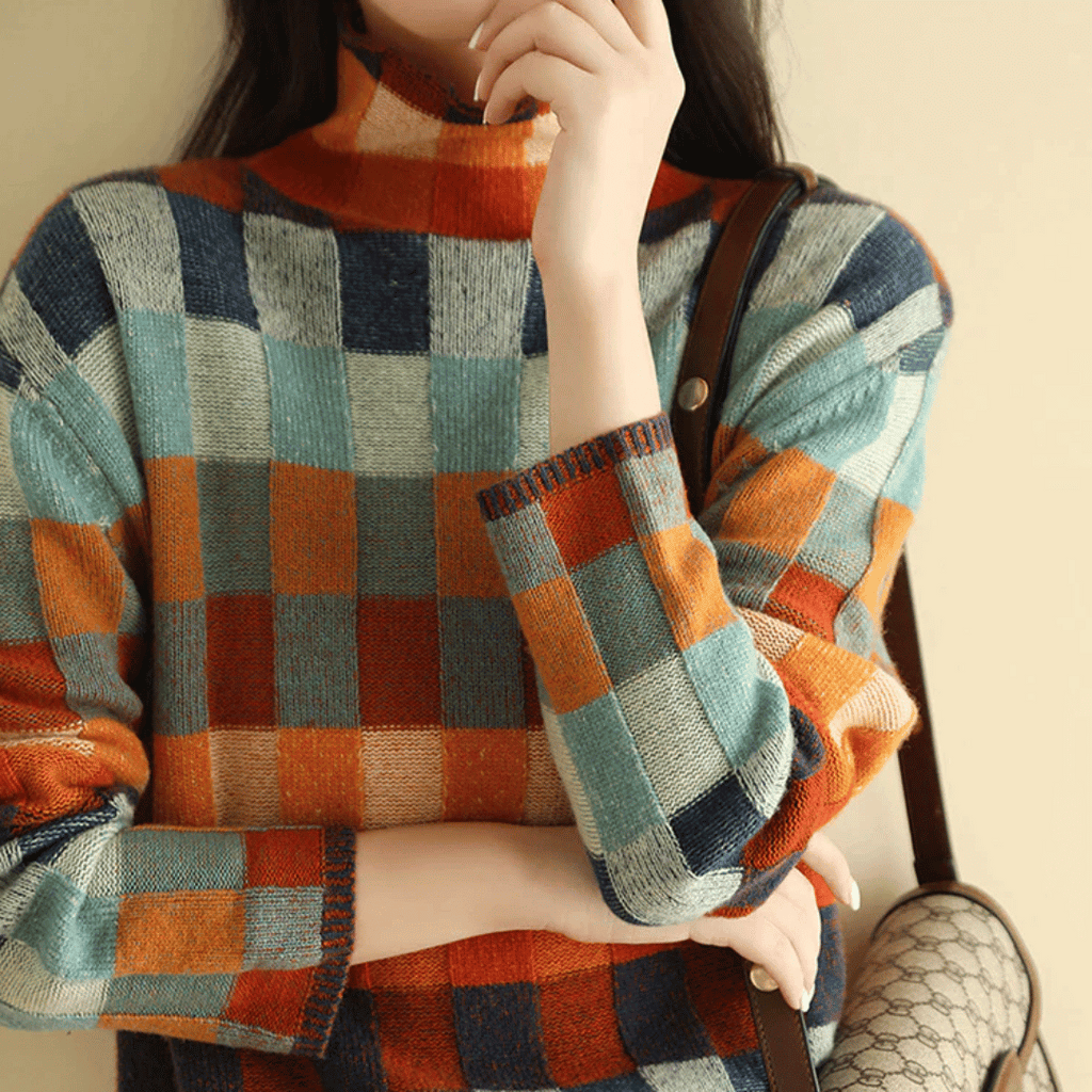 Női garbós pulóver patchwork mintával