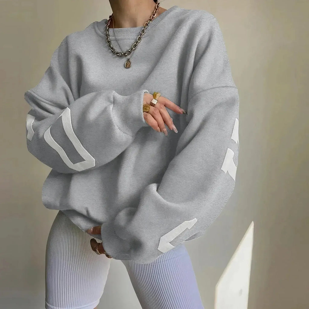 Női oversize pulóver kerek nyakkivágással és nyomattal