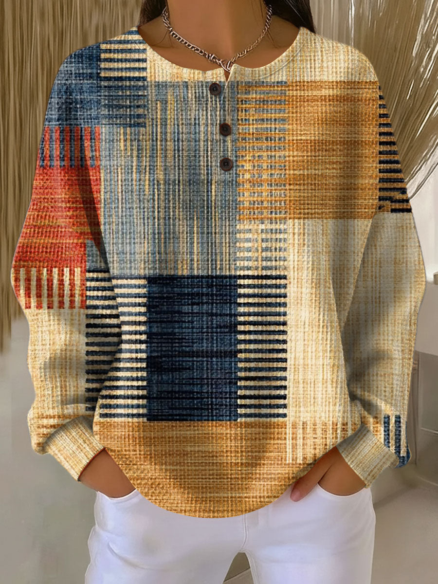 Damski sweter o geometrycznym wzorze panelowym, okrągłym dekolcie i długich rękawach