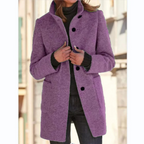 Női térdig érő kabát állógallérral és gombos záródással