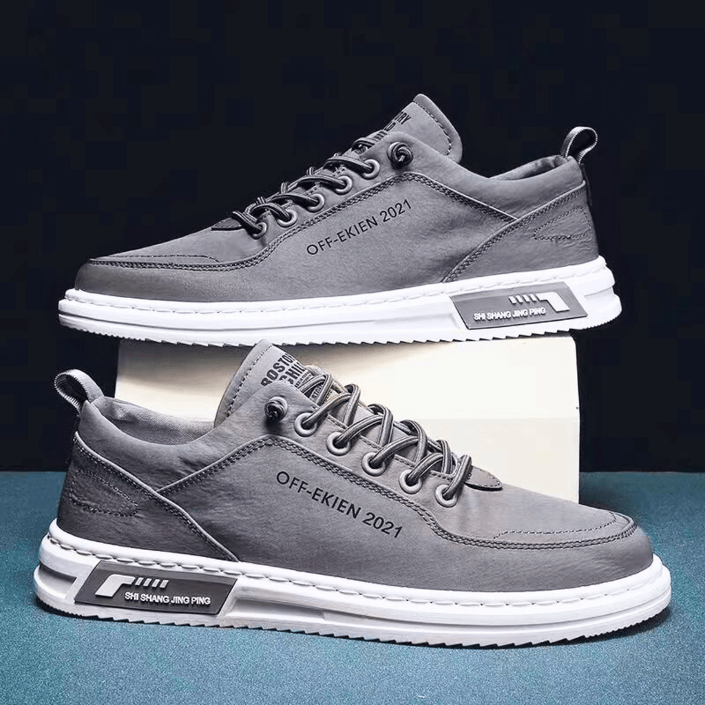 Niskie sneakersy męskie sznurowane z jasną podeszwą i ozdobnymi przeszyciami
