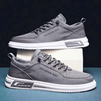 Niskie sneakersy męskie sznurowane z jasną podeszwą i ozdobnymi przeszyciami