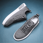 Niskie sneakersy męskie sznurowane z jasną podeszwą i ozdobnymi przeszyciami